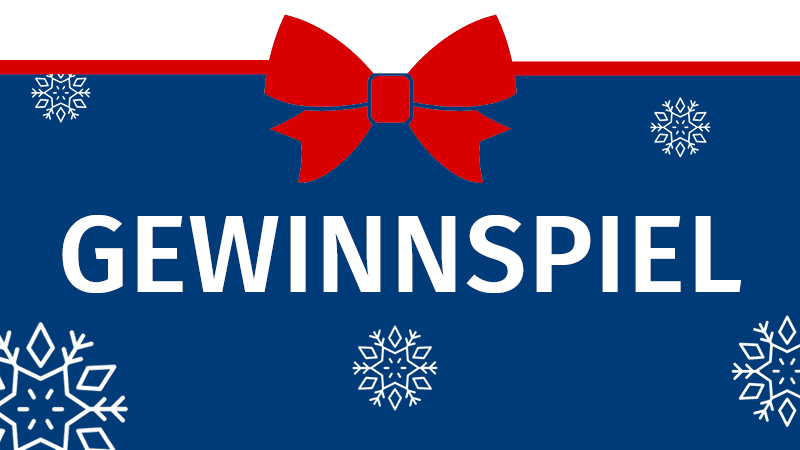 Zu sehen ist eine blaue Farbfläche. Mittig steht: "GEWINNSPIEL". Weiße Schneeflocken sind auf der blauen Fläche verteilt. Oben ist eine große rote Schleife.